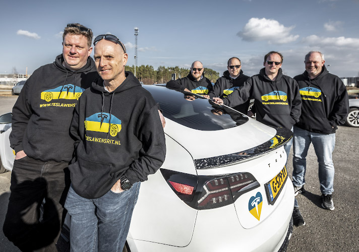 Privat dutch Tesla Team TESLAWENSRIT organizing free rides for Ukraine refugees from polish ukrainian boarder towards The Netherlands. Grünheide at Berlin, Germany March 2022