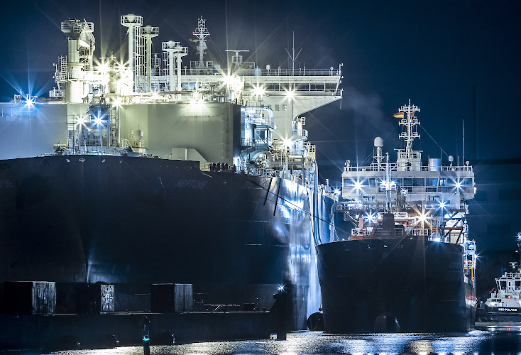 Floating LNG Terminal Neptune with Shuttle Tanker Coral Favia at Lubmin Inner Harbour. Germany 2023