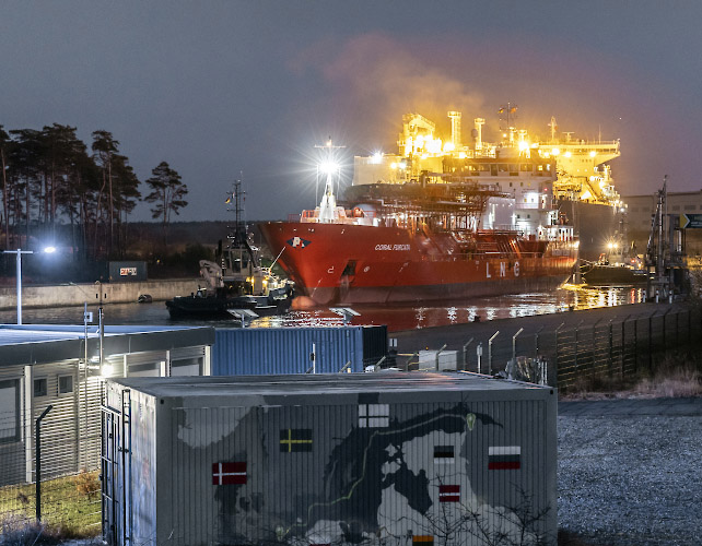 Floating LNG Terminal Neptune with Shuttle Tanker Coral Furcata at Lubmin Inner Harbour. Baltic Sea Germany 2023