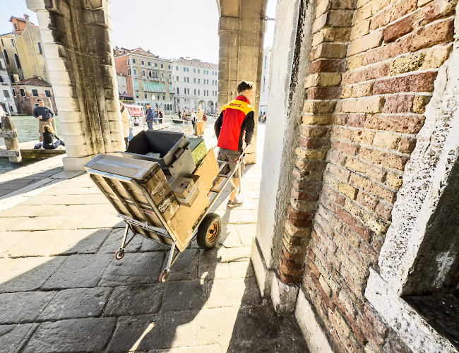 DHL Delivery Service. Excellence, simply delivered by low-emission. Venice Italy 2025